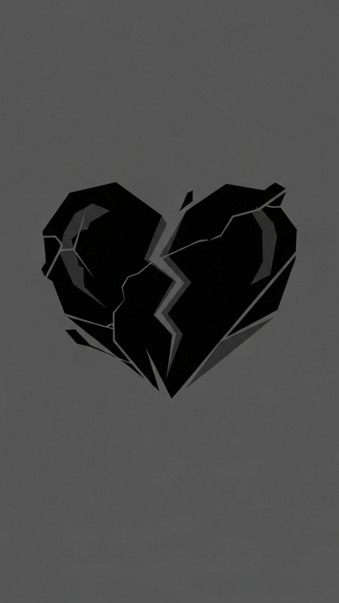 Stylized broken heart symbol in dark black and grey tones, representing heartbreak and emotional pain.