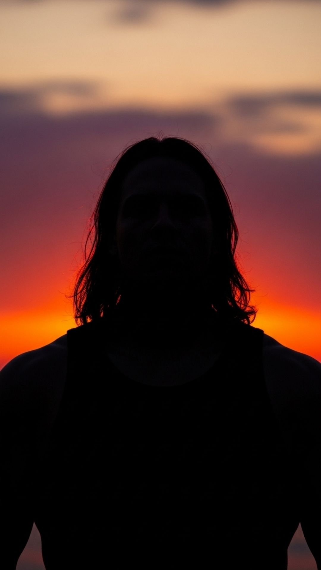 Powerful silhouette against a sunset, perfect for an unbothered attitude WhatsApp DP