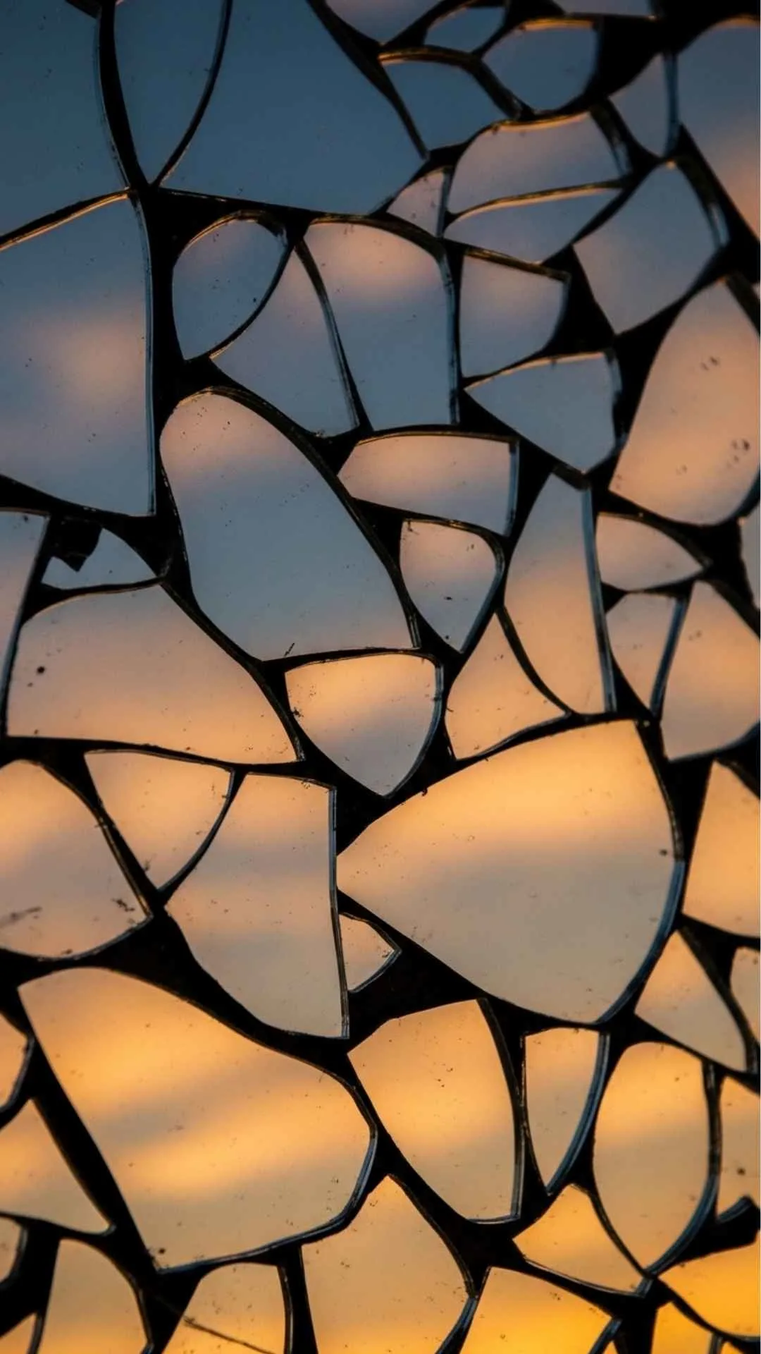 An abstract DP of a shattered mirror, with each piece reflecting a beautiful sky. A symbol of brokenness, different perspectives, and finding beauty in imperfection. #ShatteredMirror #Perspective #AbstractDP #BrokenIsBeautiful #Symbolic