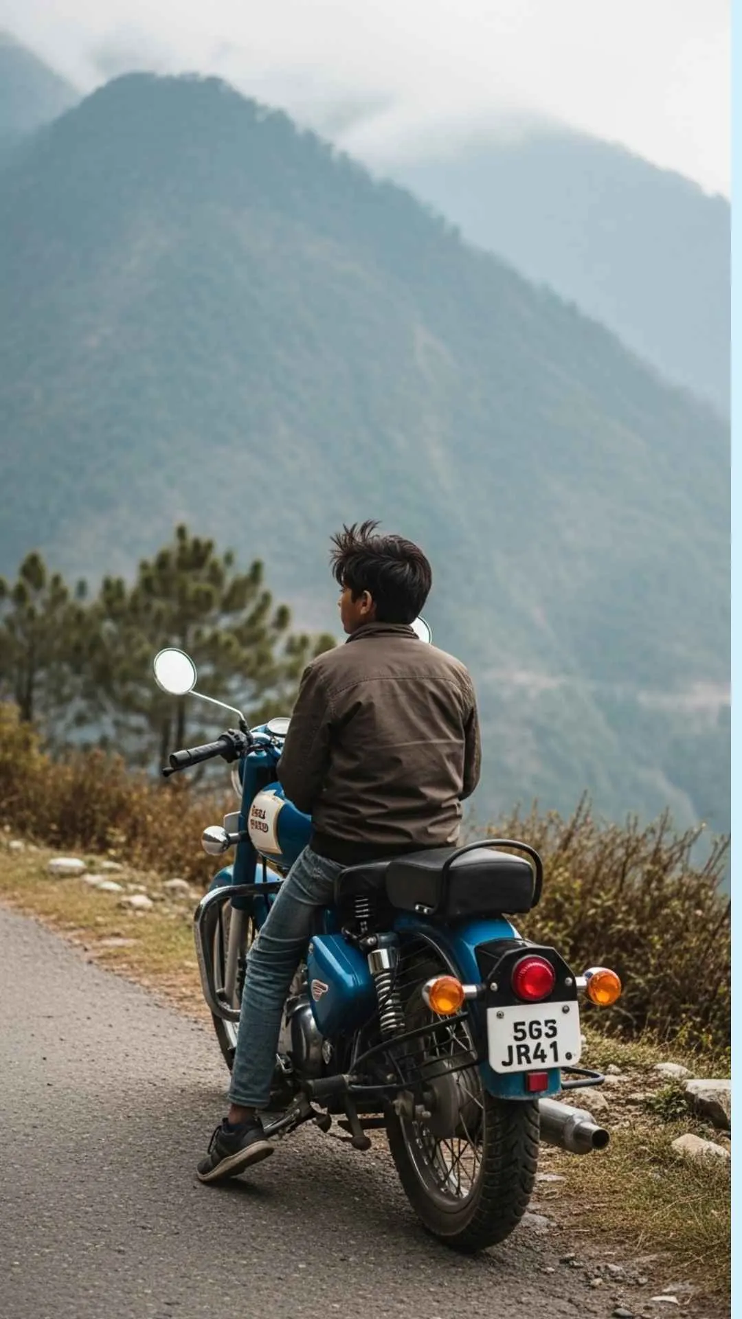 A lonely rider on a motorcycle in the mountains, a cool and sad profile picture for boys