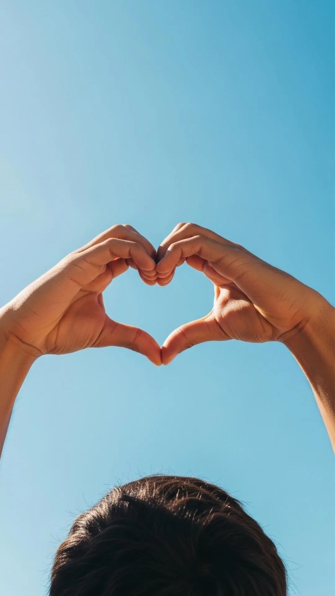 Joyful attitude DP, hands making heart, cheerful blue sky profile