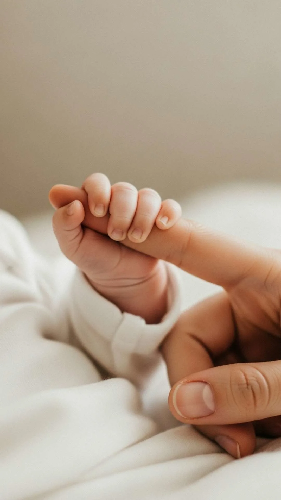 Heart-touching cute baby DP showing a baby's hand holding a finger, a lovely profile picture for WhatsApp status, free HD download.