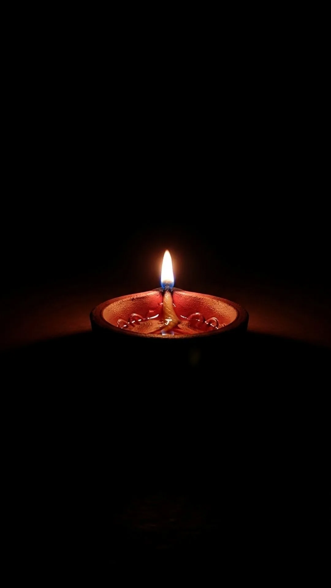 Flickering diya DP, single oil lamp, deep darkness, fragile hope, spiritual reflection, melancholic Indian symbol.