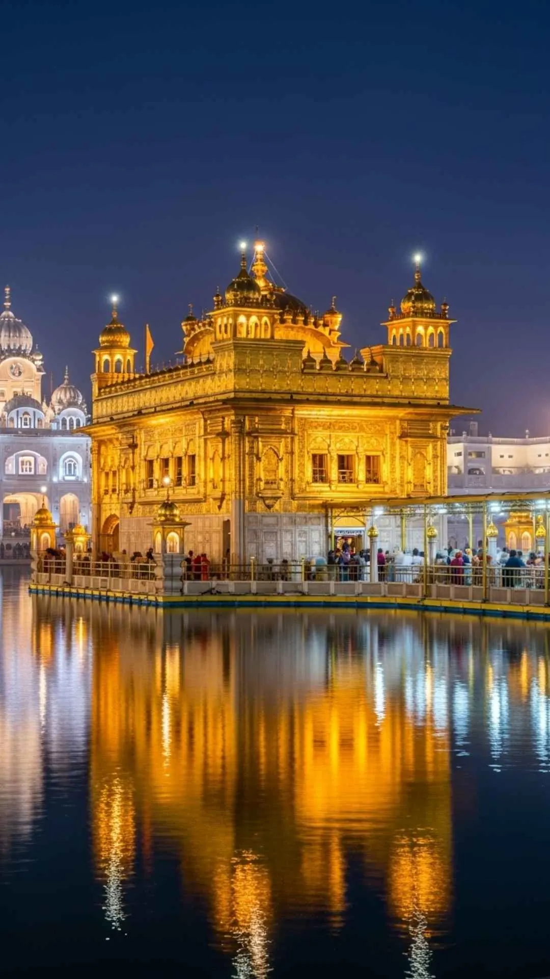 A stunning night-time DP of the illuminated Golden Temple, glowing like a beacon with its reflection on the water. A symbol of faith and hope. #GoldenTempleAtNight #HarmandirSahib #SikhDP #BeaconOfHope #Amritsar