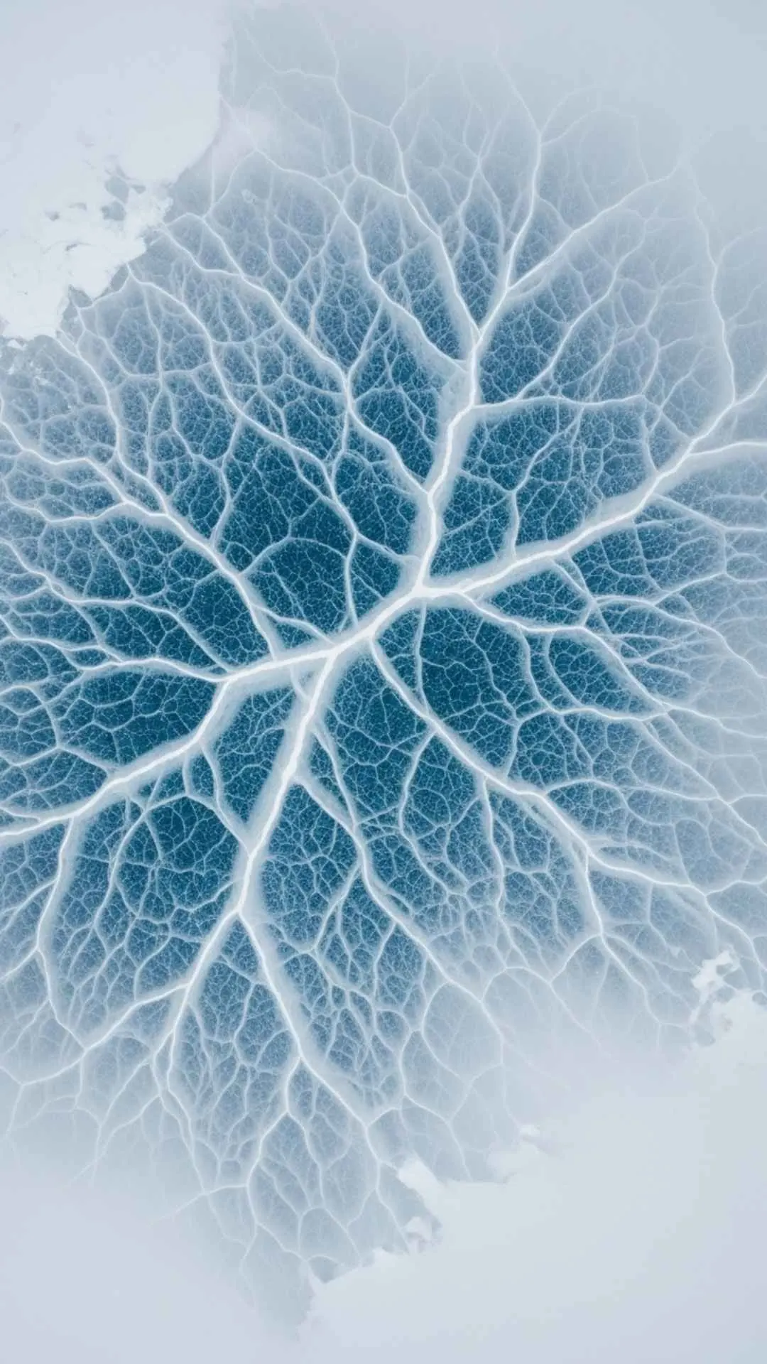 Abstract patterns of a frozen glacial lake in the Himalayas. A unique and artistic nature DP for creative individuals.