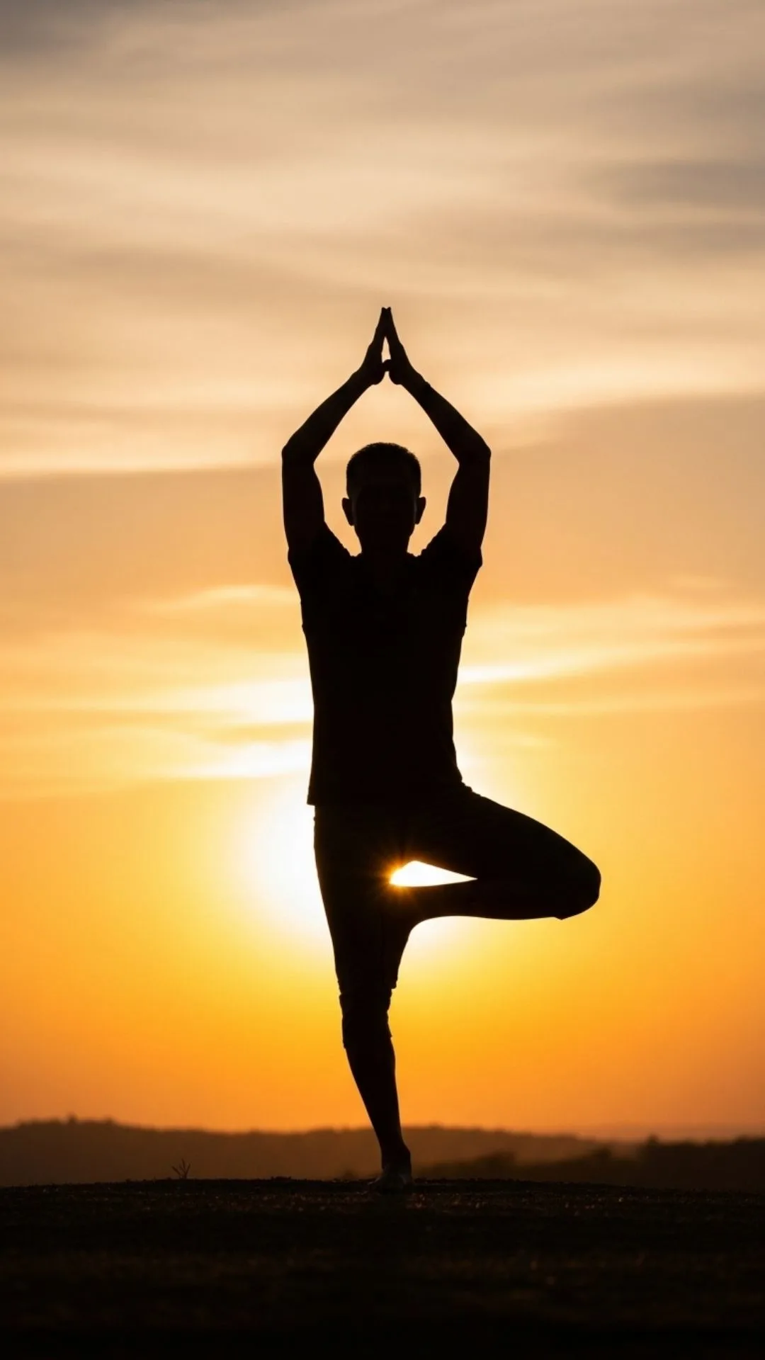 Yoga pose silhouette DP, peaceful sunrise/sunset, calm balanced aesthetic, spiritual well-being profile, meditation and mindfulness.